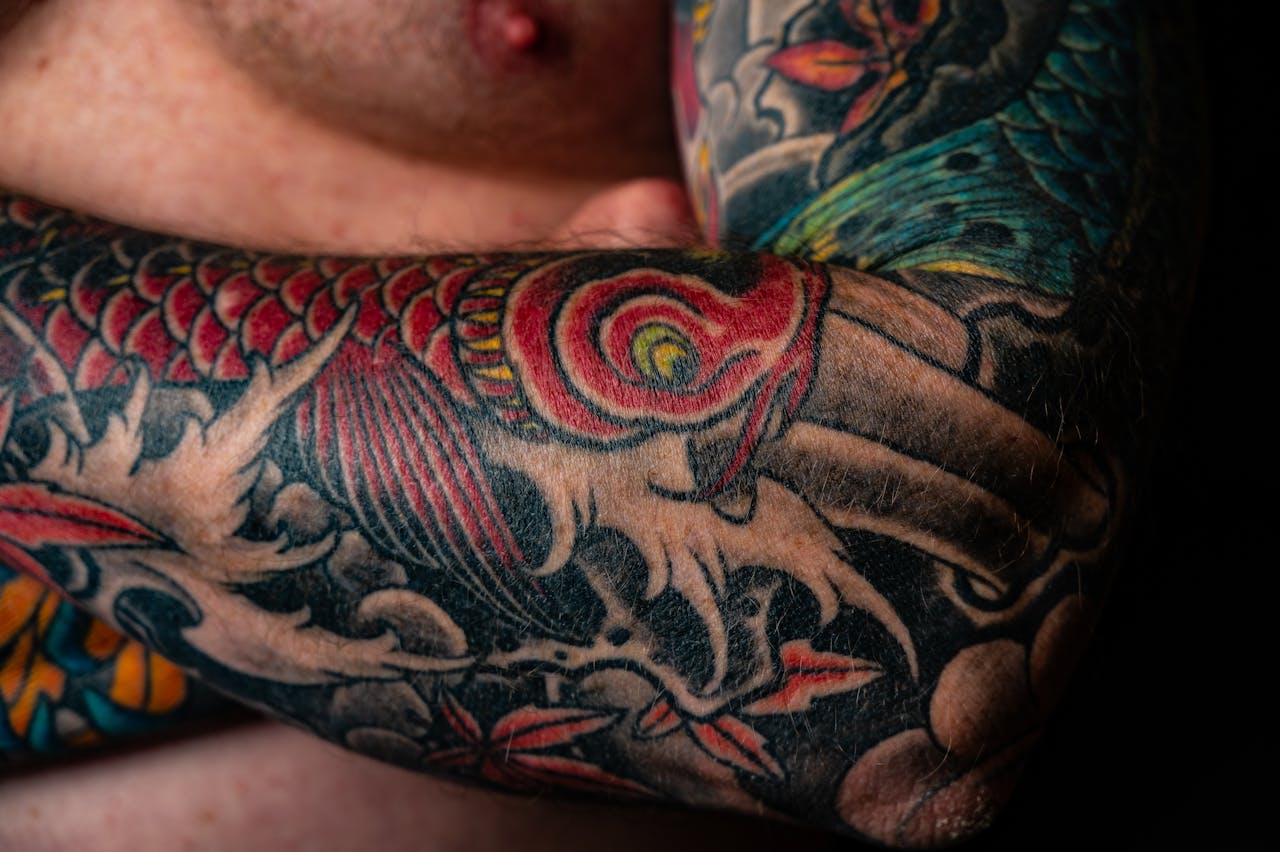 Close-up of a colorful Japanese style tattoo on a man